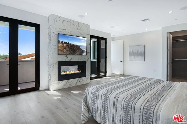 Bedroom, Fireplace, Interior, Marble Walls, Recessed Lighting, Wood Texture Flooring
