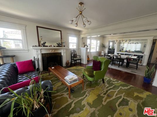 Chandelier, Dining room, Fireplace, Interior, Living room, Pendant Lights, Wood Texture Flooring