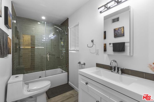 Bathroom, Glass Shower, Interior, Recessed Lighting, Wood Texture Flooring