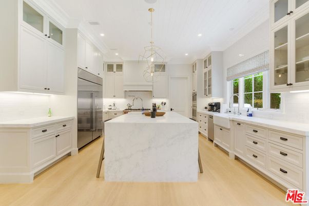 Interior, Kitchen, Marble Walls, Pendant Lights, Recessed Lighting, Stainless Steel Appliances, Wood Texture Flooring