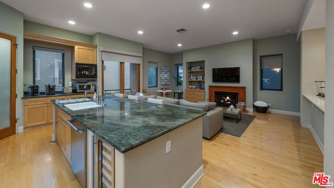 Dining room, Fireplace, Interior, Kitchen, Living room, Recessed Lighting, Wood Texture Flooring