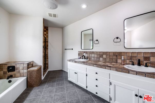 Bathroom, Dual Sink Vanities, Interior, Recessed Lighting, Tile Countertops
