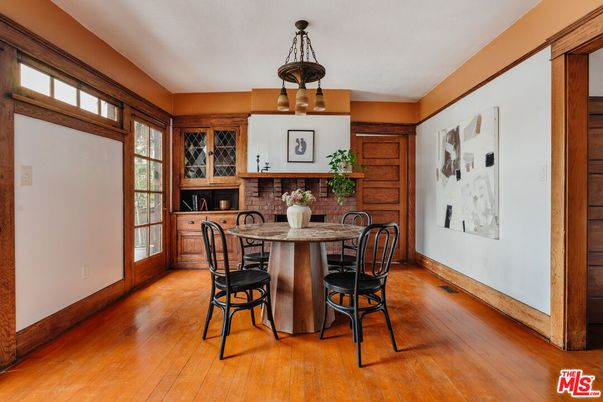 Dining room, Fireplace, Interior, Pendant Lights, Wood Texture Flooring