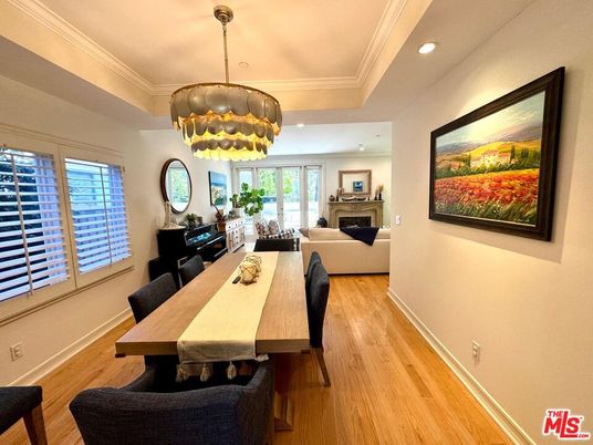 Dining room, Fireplace, Interior, Living room, Pendant Lights, Recessed Lighting, Wood Texture Flooring