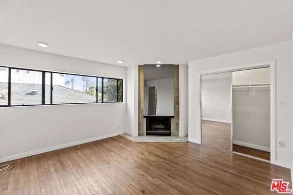 Empty room, Fireplace, Interior, Recessed Lighting, Wood Texture Flooring