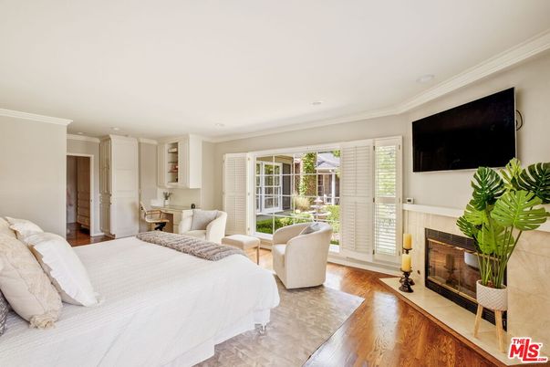 Bedroom, Fireplace, Interior, Recessed Lighting, Wood Texture Flooring