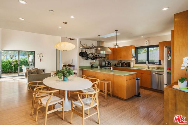 Dining room, Interior, Kitchen, Pendant Lights, Recessed Lighting, Stainless Steel Appliances, Wood Texture Flooring