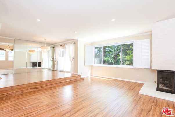 Empty room, Fireplace, Interior, Pendant Lights, Recessed Lighting, Wood Texture Flooring