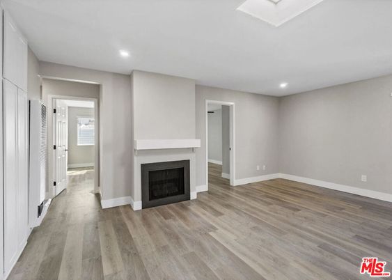 Empty room, Fireplace, Interior, Recessed Lighting, Wood Texture Flooring