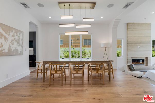 Dining room, Fireplace, Interior, Pendant Lights, Recessed Lighting, Wood Texture Flooring