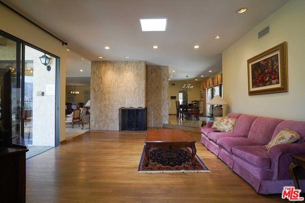 Chandelier, Dining room, Fireplace, Interior, Living room, Recessed Lighting, Wood Texture Flooring
