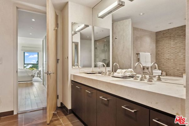 Bathroom, Dual Sink Vanities, Glass Shower, Interior, Recessed Lighting, Wood Texture Flooring