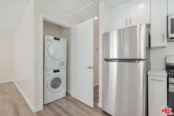 Interior, Kitchen, Recessed Lighting, Utility Closets, Washer, Wood Texture Flooring