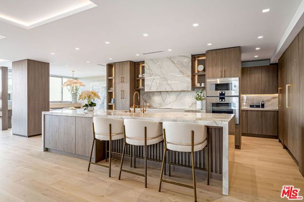 Interior, Kitchen, Marble Walls, Pendant Lights, Recessed Lighting, Stainless Steel Appliances, Wood Texture Flooring