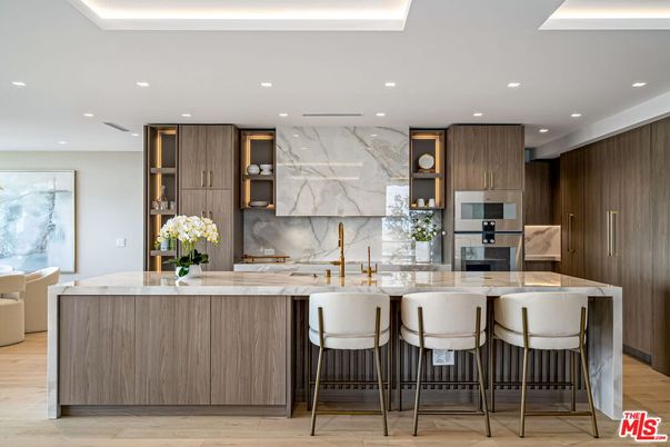 Interior, Kitchen, Marble Walls, Recessed Lighting, Stainless Steel Appliances, Wood Texture Flooring