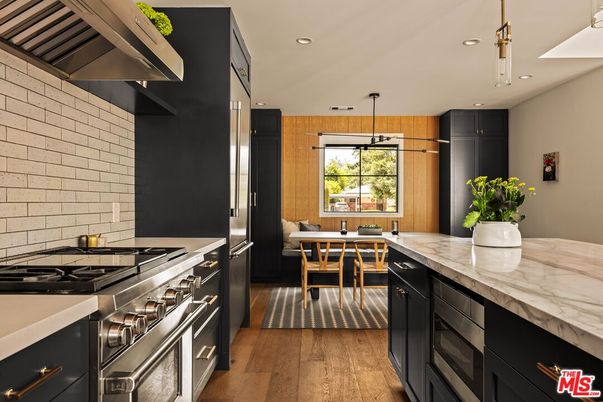 Dining room, Interior, Kitchen, Pendant Lights, Recessed Lighting, Stainless Steel Appliances, Wood Texture Flooring