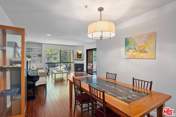 Dining room, Fireplace, Interior, Living room, Recessed Lighting, Wood Texture Flooring