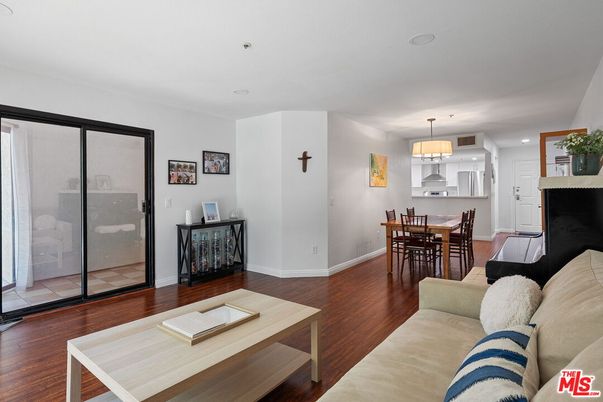 Dining room, Fireplace, Interior, Living room, Pendant Lights, Recessed Lighting, Wood Texture Flooring