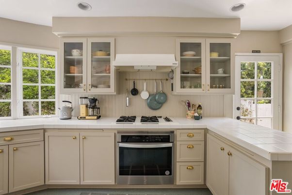 Interior, Kitchen, Recessed Lighting, Stainless Steel Appliances, Tile Countertops