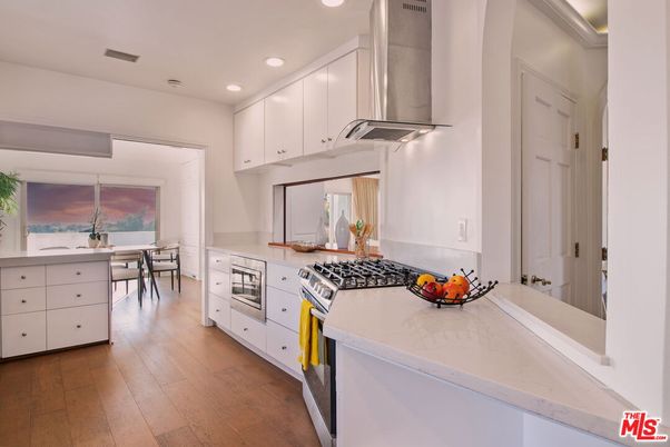 Dining room, Interior, Kitchen, Recessed Lighting, Stainless Steel Appliances, Wood Texture Flooring