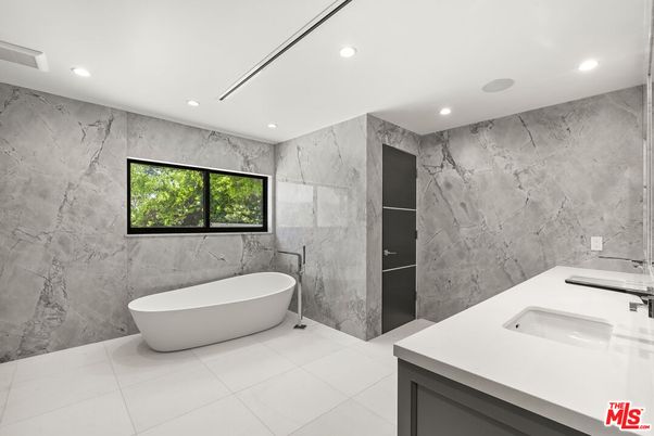Bathroom, Dual Sink Vanities, Free Standing Baths, Interior, Marble Walls, Recessed Lighting