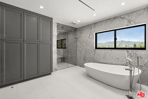 Bathroom, Free Standing Baths, Glass Shower, Interior, Marble Walls, Recessed Lighting