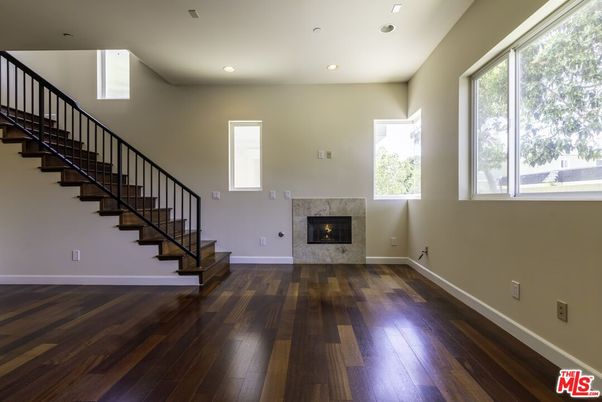 Empty room, Fireplace, Interior, Recessed Lighting, Wood Texture Flooring