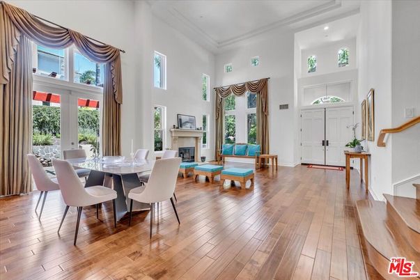Dining room, Fireplace, Interior, Living room, Recessed Lighting, Wood Texture Flooring