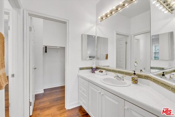 Bathroom, Dual Sink Vanities, Interior, Tile Countertops, Wood Texture Flooring
