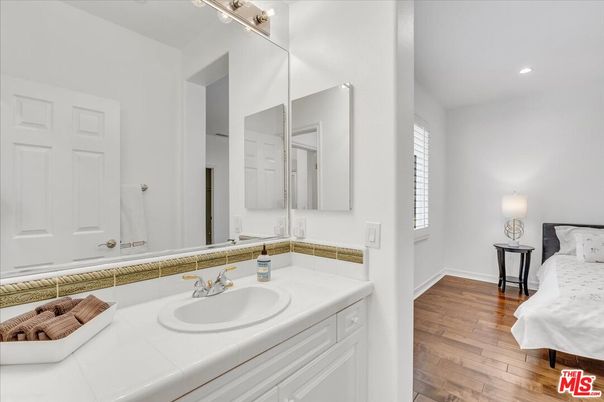 Bathroom, Interior, Recessed Lighting, Tile Countertops, Wood Texture Flooring