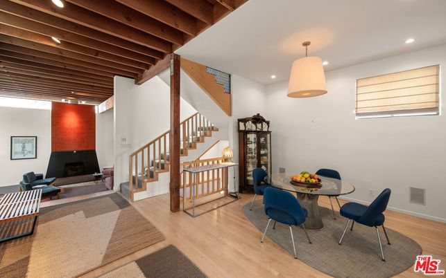 Dining room, Fireplace, Interior, Pendant Lights, Recessed Lighting, Wooden Beams, Wood Texture Flooring