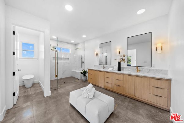 Bathroom, Dual Sink Vanities, Glass Shower, Interior, Marble Walls, Recessed Lighting