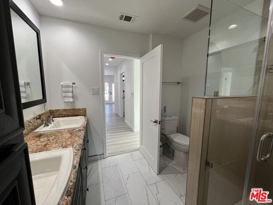 Bathroom, Dual Sink Vanities, Glass Shower, Interior, Marble, Recessed Lighting