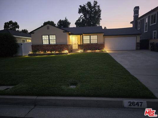 Attached, Backyard, Exterior, Facade, Brick Facade, Ranch