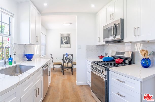 Dining room, Interior, Kitchen, Recessed Lighting, Stainless Steel Appliances, Wood Texture Flooring