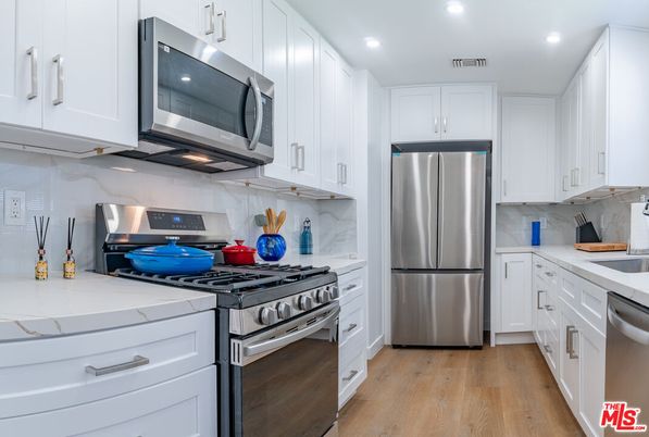 Interior, Kitchen, Recessed Lighting, Stainless Steel Appliances, Wood Texture Flooring