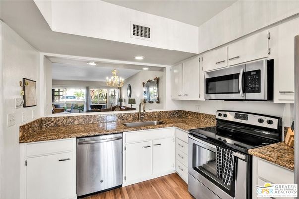 Chandelier, Interior, Kitchen, Recessed Lighting, Stainless Steel Appliances, Wood Texture Flooring
