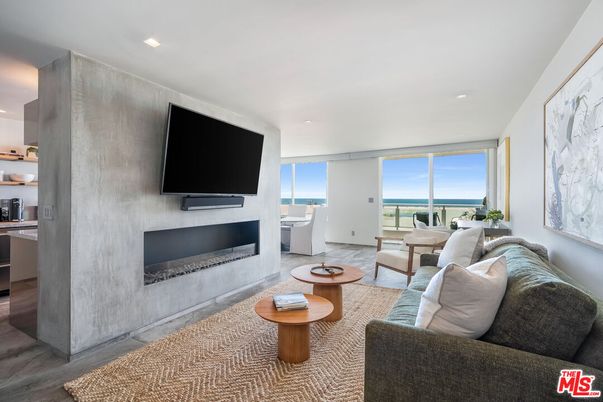 Fireplace, Interior, Living room, Recessed Lighting, Water, Wood Texture Flooring