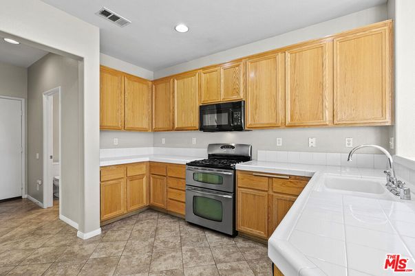 Interior, Kitchen, Recessed Lighting, Tile Countertops