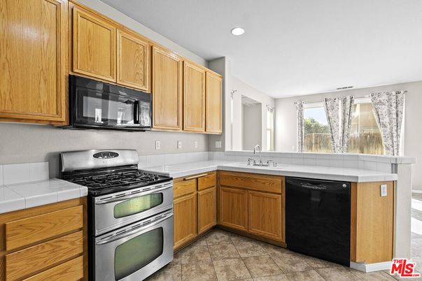 Interior, Kitchen, Recessed Lighting, Tile Countertops