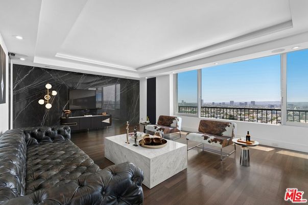 Interior, Living room, Marble Walls, Recessed Lighting, Water, Wood Texture Flooring