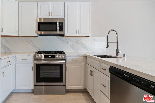 Interior, Kitchen, Marble Walls, Stainless Steel Appliances