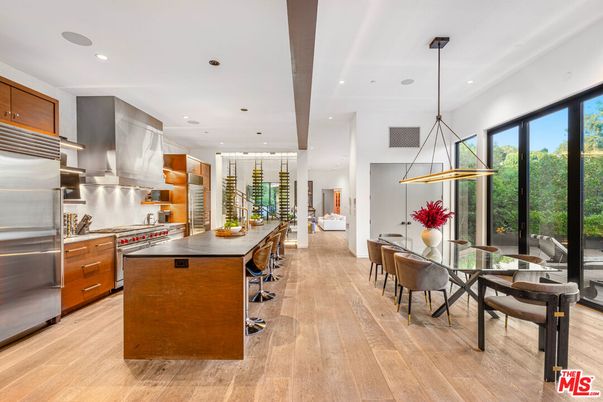 Dining room, Interior, Kitchen, Pendant Lights, Recessed Lighting, Stainless Steel Appliances, Wood Texture Flooring