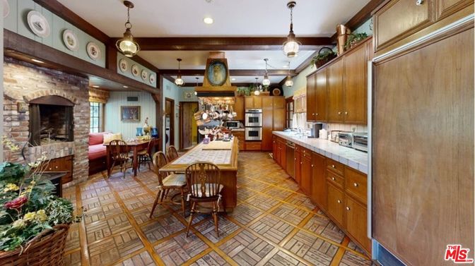 Dining room, Fireplace, Interior, Kitchen, Pendant Lights, Recessed Lighting, Stainless Steel Appliances, Stone Walls, Tile Countertops