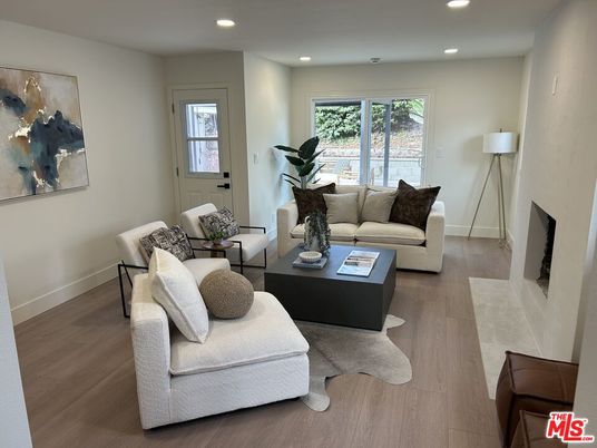Fireplace, Interior, Living room, Recessed Lighting, Wood Texture Flooring