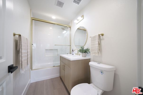 Bathroom, Glass Shower, Interior, Recessed Lighting, Wood Texture Flooring