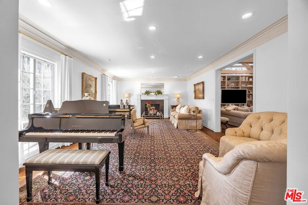 Fireplace, Interior, Living room, Piano, Recessed Lighting, Wood Texture Flooring