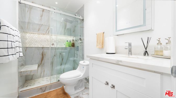 Bathroom, Glass Shower, Interior, Marble Walls, Recessed Lighting, Wood Texture Flooring