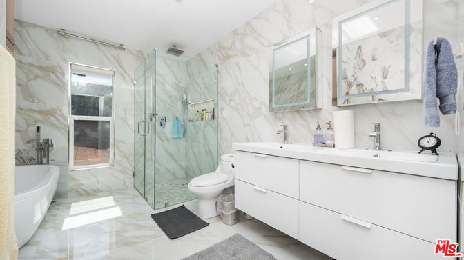 Bathroom, Dual Sink Vanities, Glass Shower, Interior, Marble, Marble Walls, Recessed Lighting