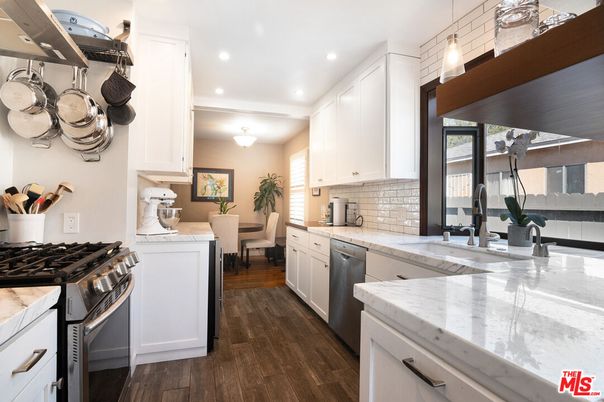 Dining room, Interior, Kitchen, Recessed Lighting, Stainless Steel Appliances, Wood Texture Flooring